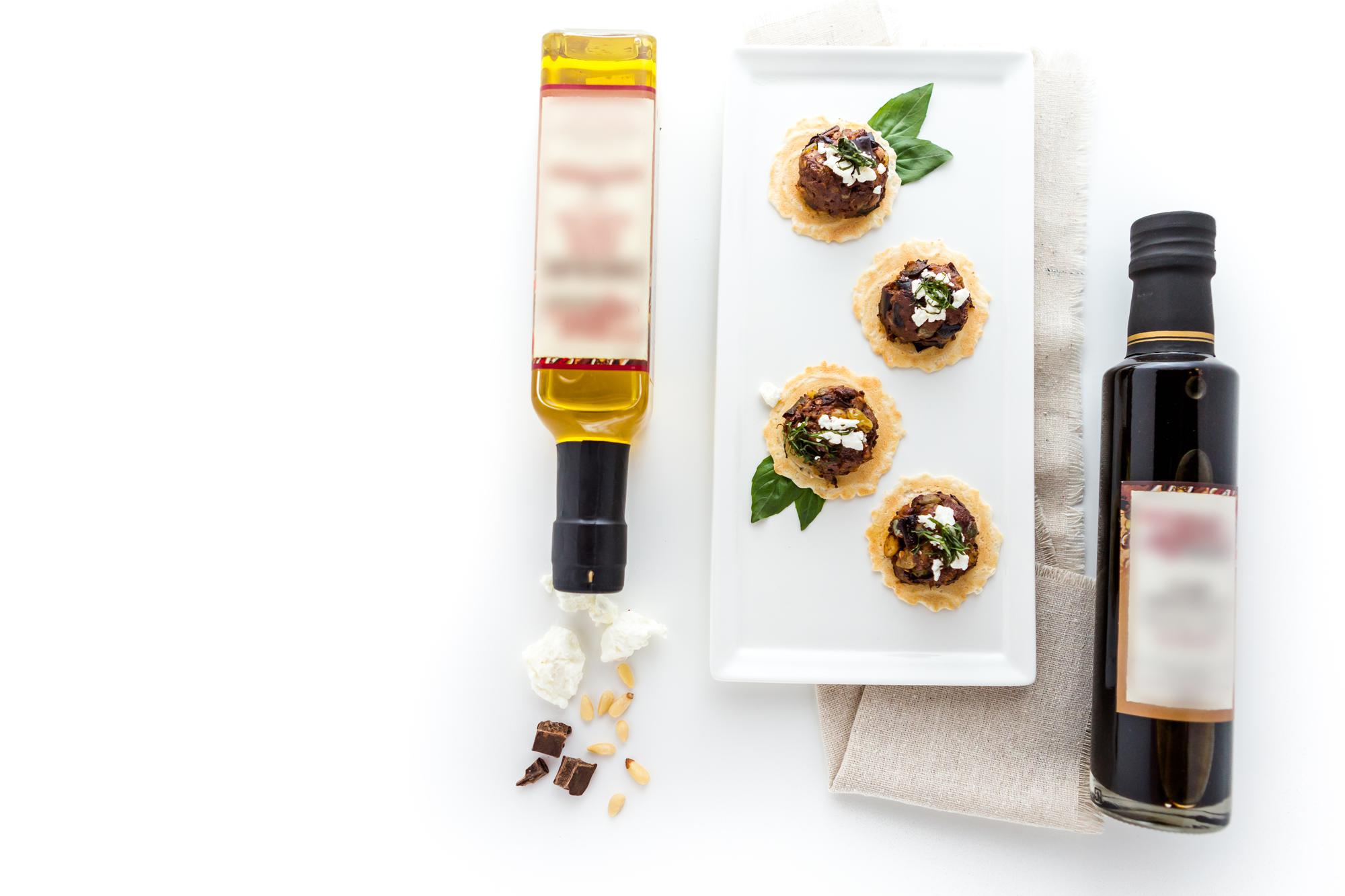 Selection of packaged gourmet products on light surface